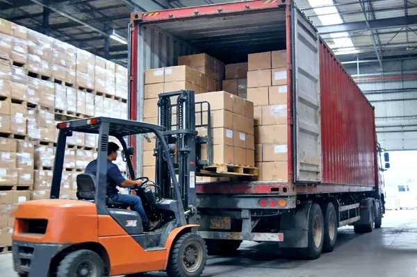 OEM Guide 10 Global logistics and delivery: Forklift loading fully packaged OEM electric toothbrush orders into a shipping container.